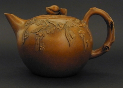 Kangxi or Yongzheng Yixing teapot with applied cherry branches - courtesy R&G McPherson Antiques